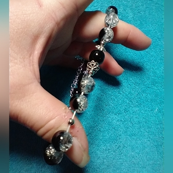 Silvertone black cracked glass butterfly stretch bracelet - Picture 2 of 3